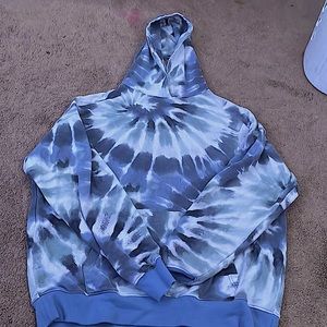 blue, green, grey, and white hoodie